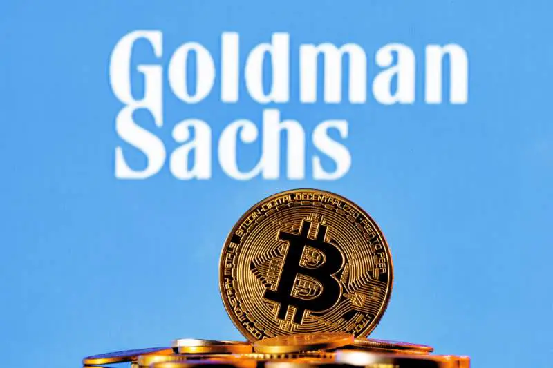 Gold bitcoin with goldman sachs in background 800w